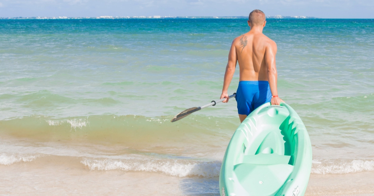 Guests enjoying exciting beach activities at Villa del Palmar Cancun.
