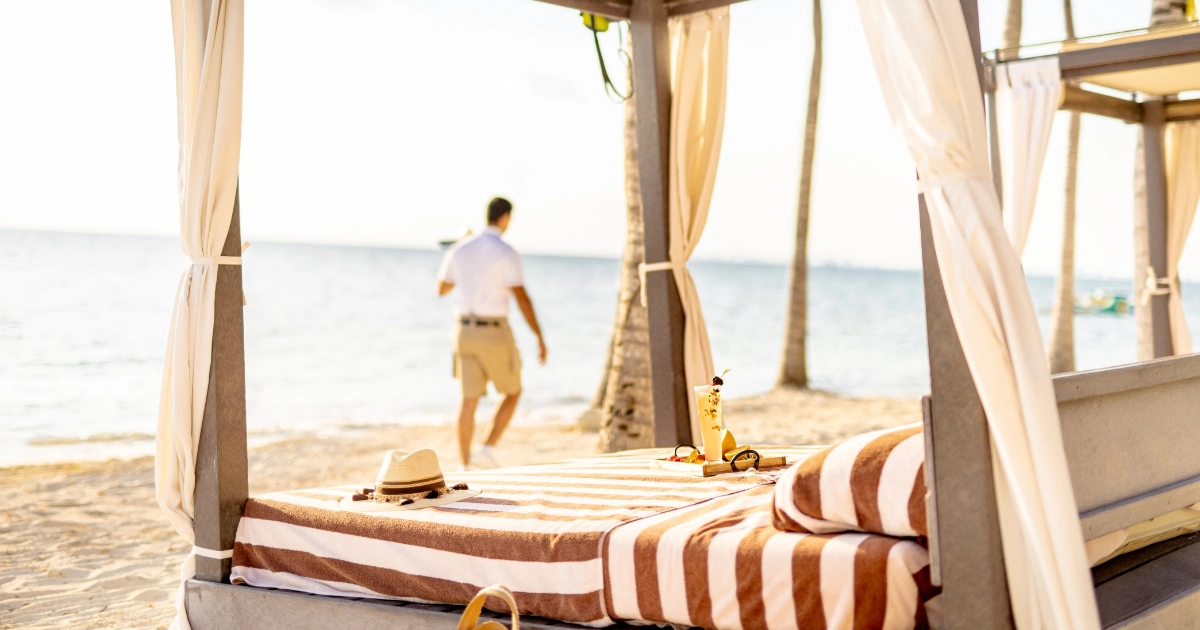 Private beach cabanas at Villa del Palmar Cancun, offering guests a comfortable and exclusive spot to relax by the sea.
