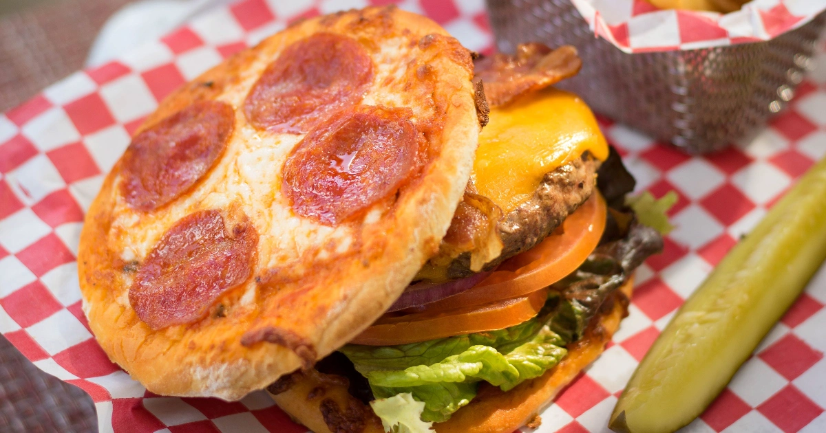 Juicy burger served at Bites Bar, perfect for a delicious snack by the pool.