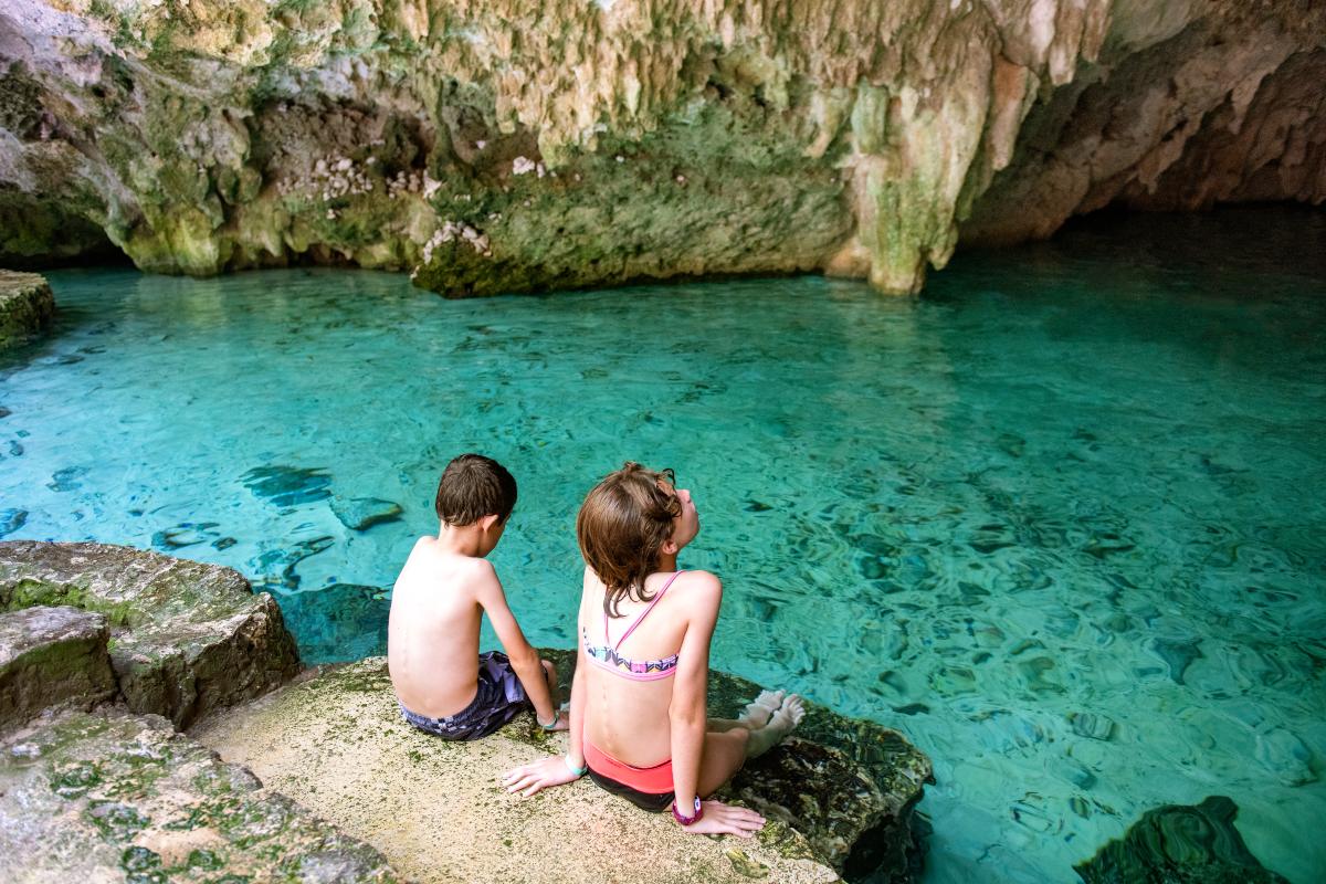 Two kids in a Cenote 