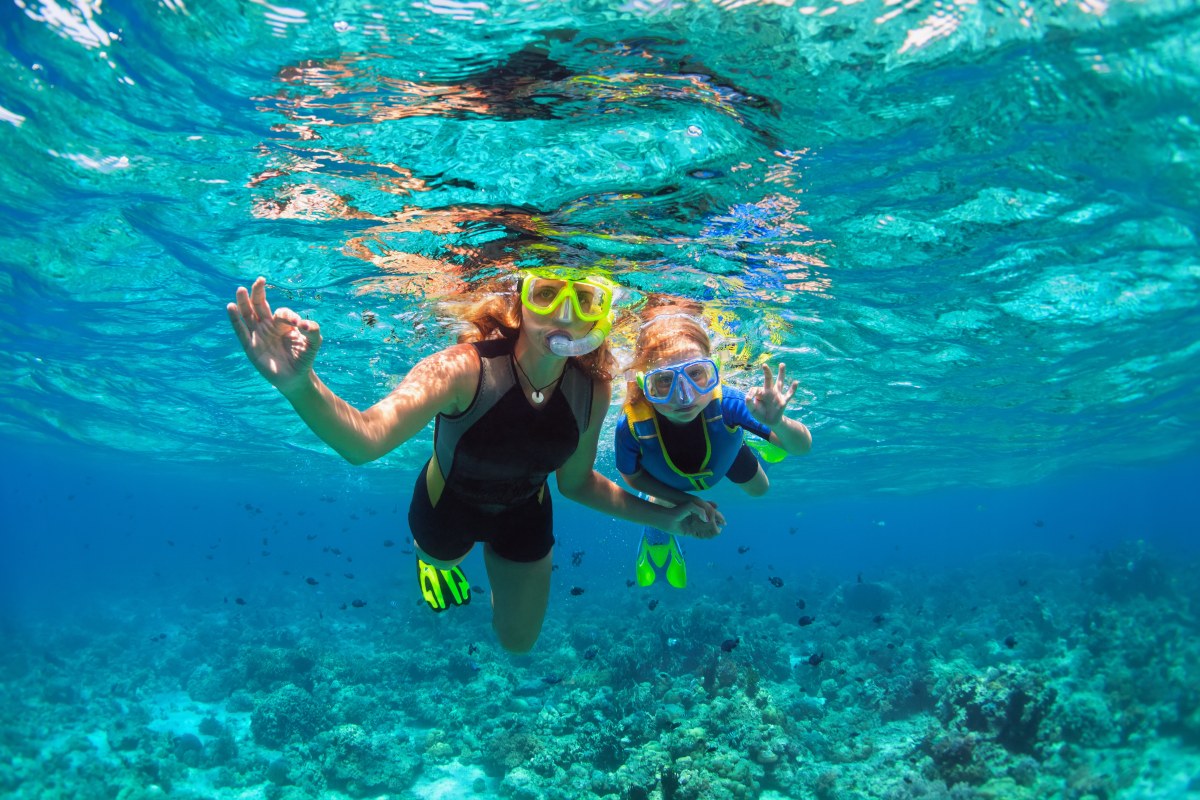 Mother and daughter snorkeling 