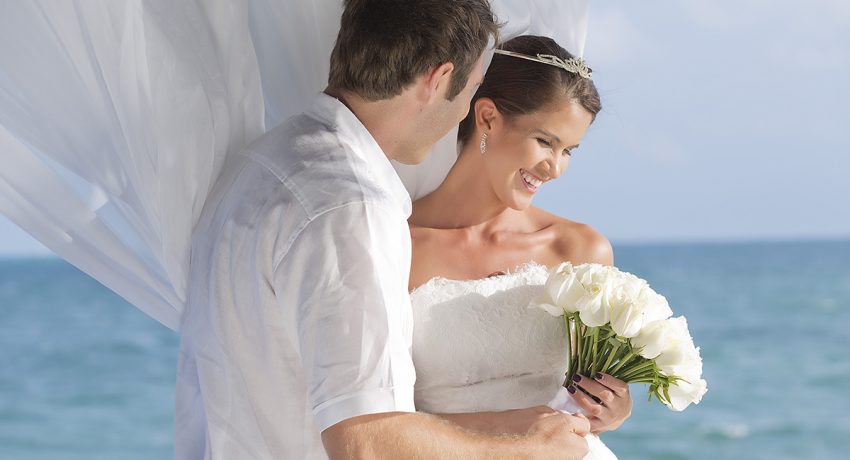 Why You Should Choose a Beach Wedding||||Save money on elaborate decor
